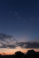 Beautiful sunset sky with clouds background. Sunset sky with clouds and sun.