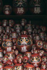 Daruma in the Dark: A Striking Presence Amidst Shadows