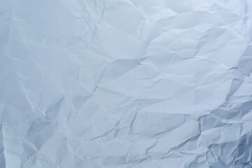 Wrinkled white paper texture background