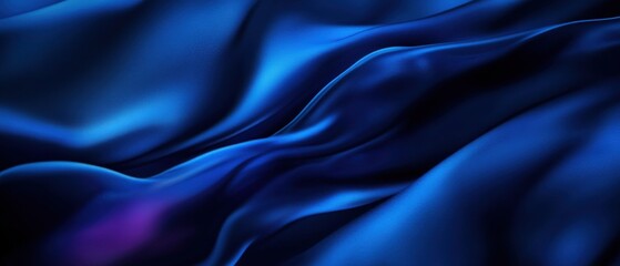 Obraz premium Luxurious dark blue silk satin fabric background with elegant folds and waves Smooth, shiny, and flowing textile texture Abstract backdrop for luxury, fashion, or design concepts