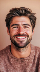 Obraz premium Smiling Man Portrait: Joyful, Brown Hair, Beard and Sweater