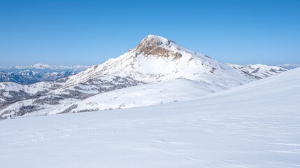 Fototapeta premium Snowy mountain peak, clear sky, winter landscape, scenic view, travel photography