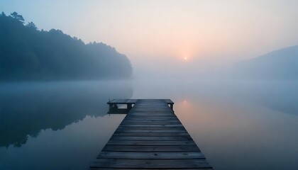 Naklejka premium Calm water reflecting mist foggy lake at dawn photography serene environment tranquil viewpoint nature's beauty