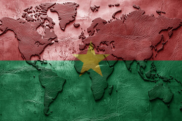 Fototapeta premium Flag of burkina faso on the ancient leather old world map . Adventure concept. Macro shot. Generative Ai