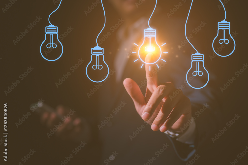 Poster businessman using hand pointing and showing virtual light bulb in the creative idea and concept of i