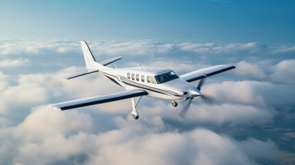 Obraz premium small aircraft flying above fluffy clouds in clear blue sky, showcasing its sleek design and powerful presence