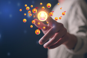 Man using finger pointing at happy emotional icon in concept of happy love and satisfaction impression