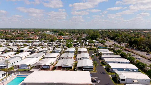 Aerial drone stock video trailer park with mobile homes Naples Florida