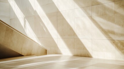 Sunbeams illuminating a modern minimalist interior with beige tiled walls and staircase.