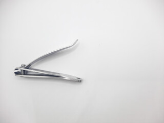 Stainless steel nail clippers with white background 