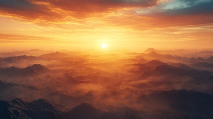 Fototapeta premium Vibrant sunset over a misty mountain range.