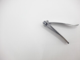 Stainless steel nail clippers with white background 