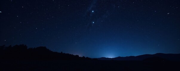 Naklejka premium Dark celestial night with twinkling stars against a black canvas, stars, cosmos