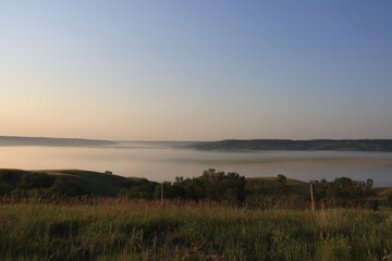 Obraz premium Foggy Morning at Sunrise in the Valley.