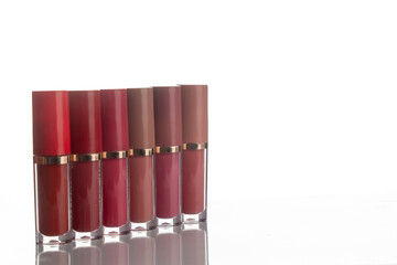Set of Liquid Lipsticks, pigment colors isolated on white space, negative with the beauty of the product