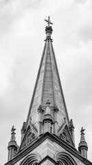 Church spire detail, overcast sky, urban setting, religious architecture