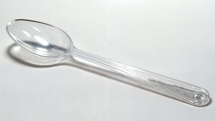 transparent plastic spoon