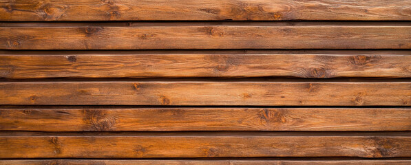 Fototapeta premium close up view of brown wooden slat texture background, showcasing natural grain and warmth of wood. This evokes rustic and cozy atmosphere