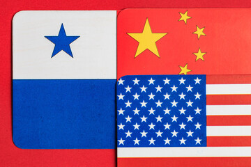 Flags of panama, china and usa on red background with simplified designs