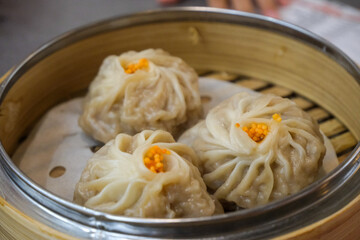 Delicious Traditional Dim Sum Xiao Long Bao in Bamboo Steamer