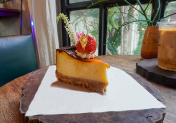 Delicious, soft cheesecake decorated with strawberries.