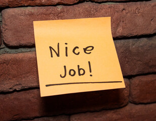 Encouraging note on wall celebrates a job well done