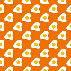 Seamless pattern fried eggs on orange background.