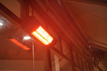 Warm glowing heater provides comfort on a chilly evening