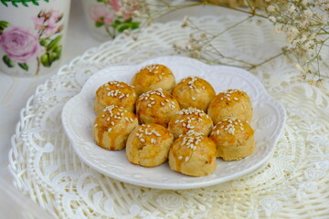Popular peanut cookies in Malaysia during celebration of Eid Mubarak (Hari Raya) on white background.