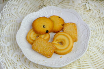 Popular cookies known as butter cookies in Malaysia during celebration of Eid Mubarak (Hari Raya) on white background.