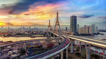 The Bhumibol Bridge (Industrial Ring Road Bridge) (Bangkok, Thailand) Beautiful view at sunset, Bangkok Expressway top view, expressway and motorway at sunset Aerial view from drone