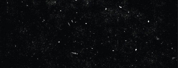 A grunge background with a black background, featuring a speckled texture. The background is dark and gritty, with a black, dusty appearance. Minimal grunge speckled texture vector background