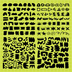 Abstract shapes in black on a yellow grid. Shapes vary in size and form. Bold black shapes contrast with yellow. Shapes create a dynamic visual pattern. Funky shapes vector set.