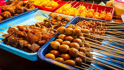 Satay-satean dishes served at Yogyakarta's angkringan stalls include quail eggs, chicken skin, chicken offal, feet and various fried foods.