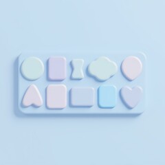 A colorful set of shapes is arranged on a blue surface.