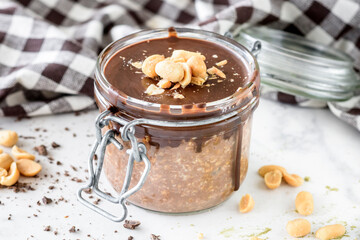 Peanuts butter muse in the glass jar 