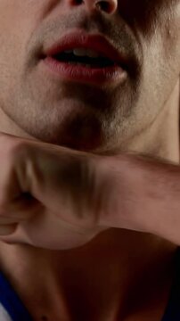 Determined sportsman holding ball