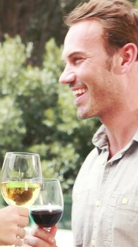 Smiling couple with jealous woman on background