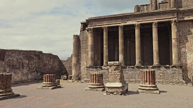 POMPEII, ITALY - MAY 21, 2024:Ruins of Ancient Basilica structure in Pompeii, Italy-Pan