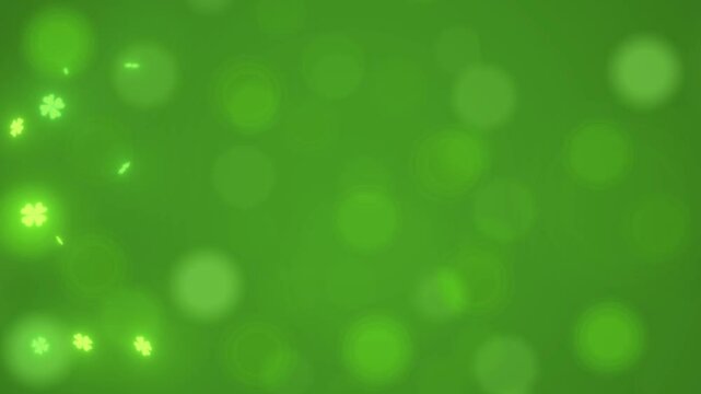 Defocused Bokeh green background, glitter float ,St. Patrick's Day, shamrocks clover, green Four-leafed. Irish holiday party celebration, 4 leaves, good luck, march 17th, 4k Half side free copy space