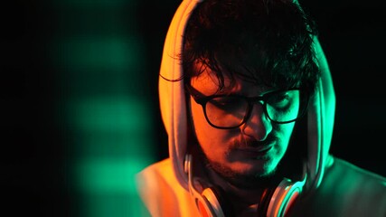 Portrait of Hacker or Programmer in Front of Computer Screen in Dark Room, Close Up - Powered by Adobe