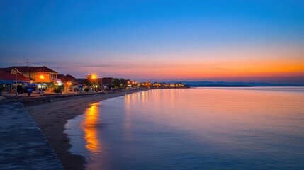 Coastal Town At Sunset With Tranquil Sea And Vibrant Sky