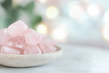 Tranquil Scene of Pink Rose Quartz Crystals on Marble Surface with Soft Focus Background