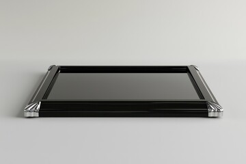 3D mock-up features a black frame with beveled chrome edges, perfectly symmetrical on a neutral matte gradient.