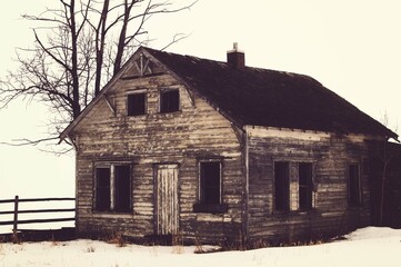 old abandoned house in the winter