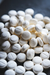 White circular pills