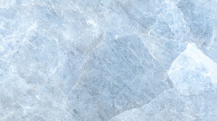 Fototapeta premium A close-up of a light blue marble surface showcasing its natural texture and patterns.