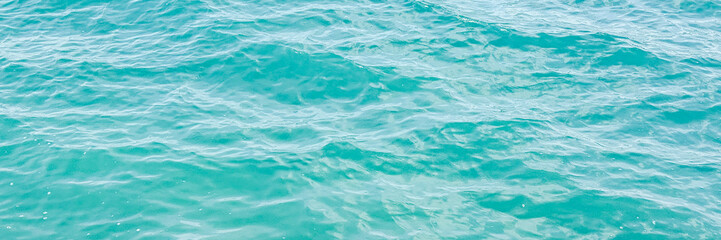 Clear turquoise ocean waves gently rippling, summer vacation peaceful serenity, nature's soothing aquatic texture