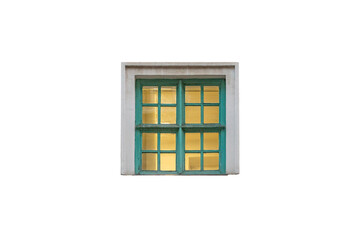 Illuminated light green old classic wooden closed window with many panes is isolated.