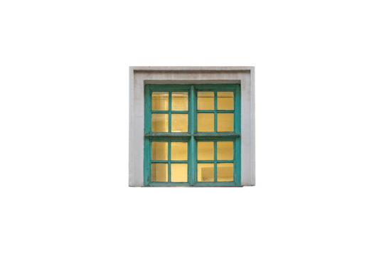Illuminated light green old classic wooden closed window with many panes is isolated.